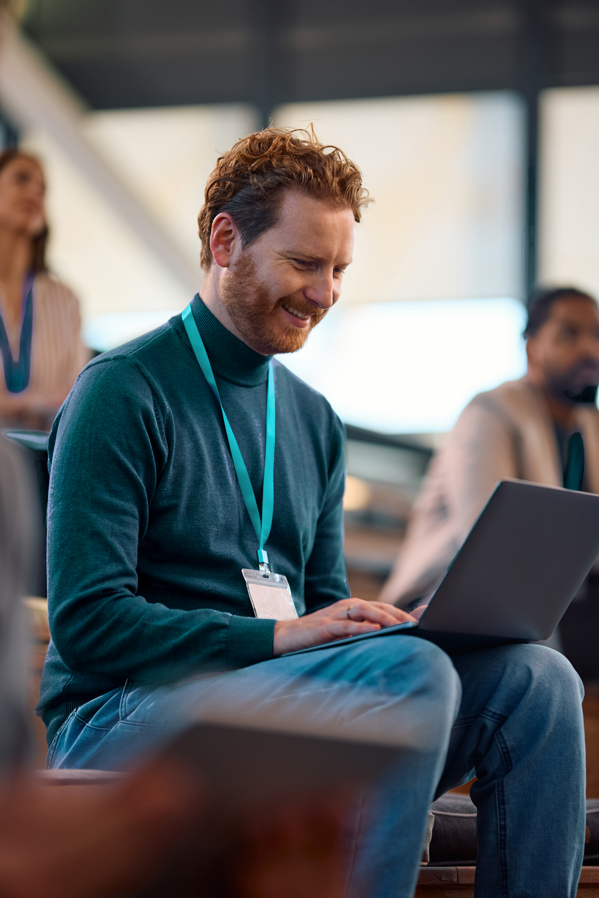 Faculty member using laptop